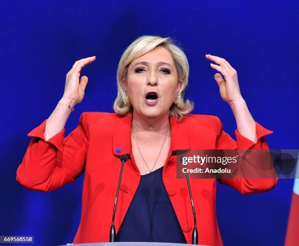 French Presidential Election candidate Marine Le Pen, the leader of France's far-right Front National political party delivers her speech during a...