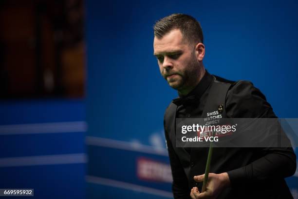 Jimmy Robertson of England reacts during his first round match against Mark Allen of Northern Ireland on day three of Betfred World Championship 2017...