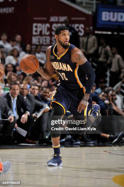 Paul George of the Indiana Pacers handles the ball against the Cleveland Cavaliers during Game Two of the Eastern Conference Quarterfinals of the...