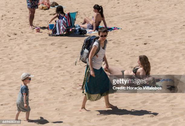 Beachgoers at Praia da Duquesa on April 16, 2017 in Cascais, Portugal. Although active all year round, Portuguese tourist industry is hoping for an...