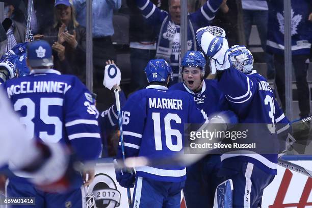 Auston Matthews celebrates as the Toronto Maple Leafs beat the Washington Capitals 4-3 in overtime in game three of their NHL first round play-off at...