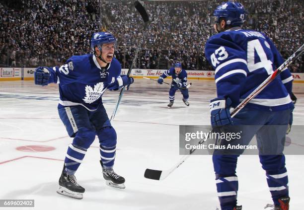 Tyler Bozak of the Toronto Maple Leafs celebrates his game winning goal in the 1st overtime against the Washington Capitals in Game Three of the...