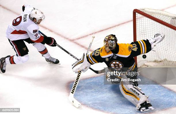 Bobby Ryan of the Ottawa Senators scores against Tuukka Rask of the Boston Bruins during overtime in Game Three of the Eastern Conference First Round...