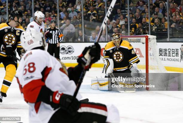 Boston Bruins goalie Tuukka Rask makes the save on a shot from Ottawa Senators left wing Mike Hoffman during Game 3 of a first round NHL playoff game...