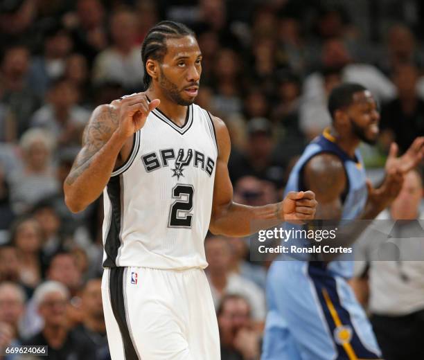 Kawhi Leonard of the San Antonio Spurs reacts after a basket against the Memphis Grizzlies in Game Two of the Western Conference Quarterfinals during...