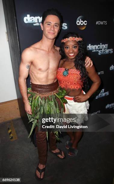 Olympian Simone Biles and dancer Sasha Farber attend "Dancing with the Stars" Season 24 at CBS Televison City on April 17, 2017 in Los Angeles,...