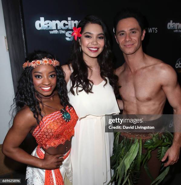 Olympian Simone Biles and dancer Sasha Farber poses with singer Auli'i Cravalho at "Dancing with the Stars" Season 24 at CBS Televison City on April...