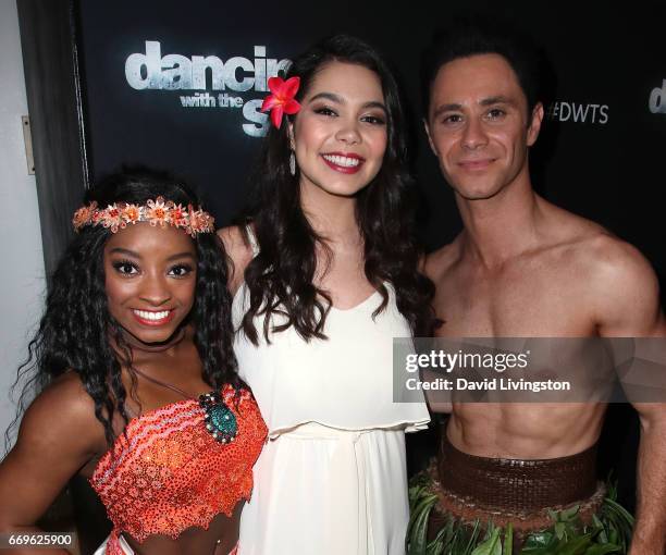 Olympian Simone Biles and dancer Sasha Farber poses with singer Auli'i Cravalho at "Dancing with the Stars" Season 24 at CBS Televison City on April...