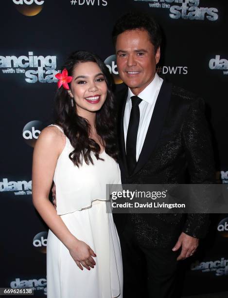 Singers Auli'i Cravalho and Donny Osmond attend "Dancing with the Stars" Season 24 at CBS Televison City on April 17, 2017 in Los Angeles, California.