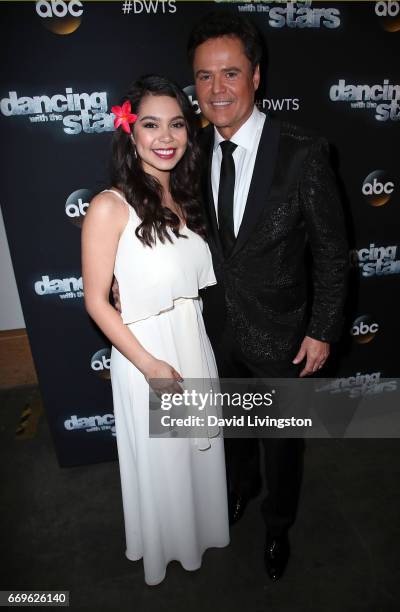 Singers Auli'i Cravalho and Donny Osmond attend "Dancing with the Stars" Season 24 at CBS Televison City on April 17, 2017 in Los Angeles, California.