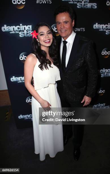 Singers Auli'i Cravalho and Donny Osmond attend "Dancing with the Stars" Season 24 at CBS Televison City on April 17, 2017 in Los Angeles, California.