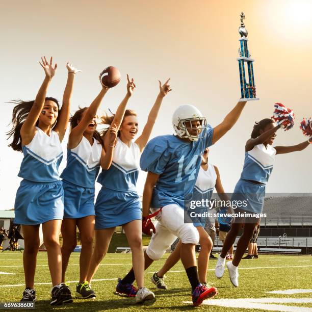 football cheerleaders & player - black cheerleaders stock pictures, royalty-free photos & images