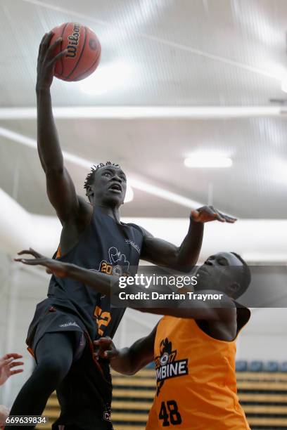 Lat Mayen drives to the basket during the NBL Combine 2017/18 at Melbourne Sports and Aquatic Centre on April 18, 2017 in Melbourne, Australia.