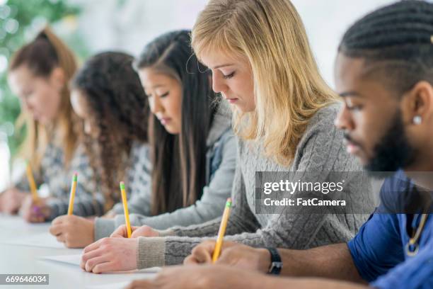 writing a test - high school building stock pictures, royalty-free photos & images