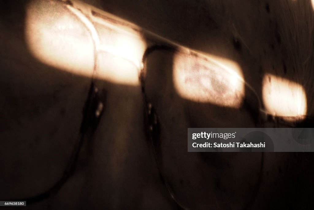 Sunlight pours into a photograph of former Khmer Rouge head...
