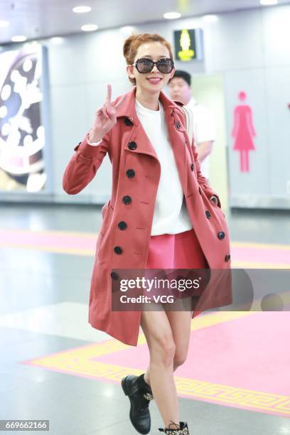 Model Lin Chi-ling arrives at Beijing Capital International Airport to head for Shanghai on April 18, 2017 in Beijing, China.