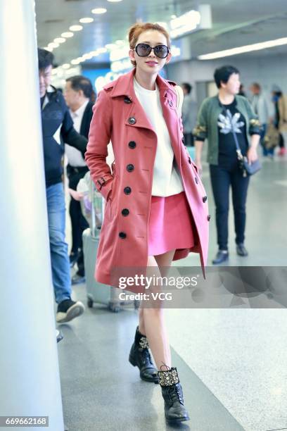 Model Lin Chi-ling arrives at Beijing Capital International Airport to head for Shanghai on April 18, 2017 in Beijing, China.