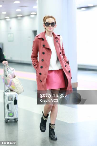 Model Lin Chi-ling arrives at Beijing Capital International Airport to head for Shanghai on April 18, 2017 in Beijing, China.