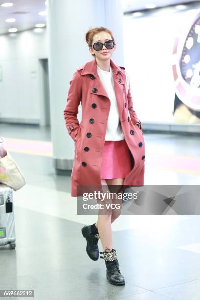 Model Lin Chi-ling arrives at Beijing Capital International Airport to head for Shanghai on April 18, 2017 in Beijing, China.