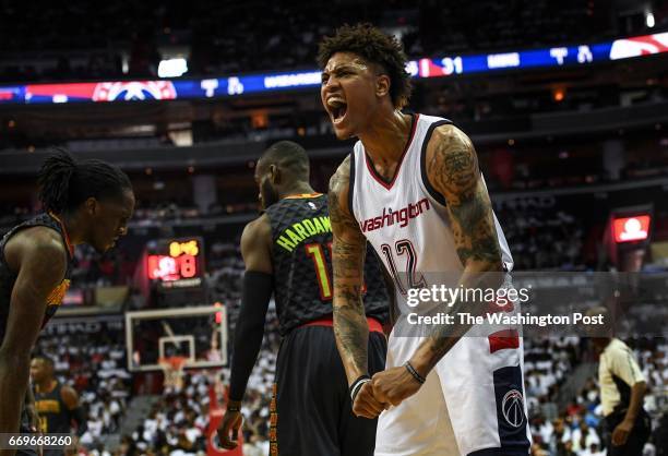 Washington Wizards forward Kelly Oubre Jr. Screams after forcing a turnover during the first half of Game One of the NBA Eastern Conference Playoffs...