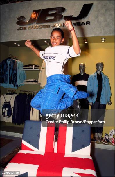 Year old British Go Kart racing driver Lewis Hamilton attending a promotional event for the Joe Bloggs brand at Earls Court in London, circa...