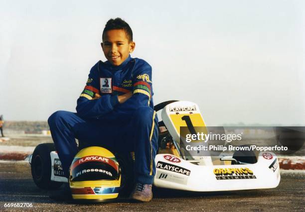 British Junior Go Kart racer, Lewis Hamilton, aged 10, ready for a drive at Kimbolton race track in England, 19th December 1995.