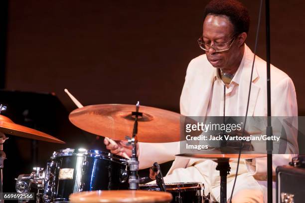American Jazz musician Louis Hayes plays drums with the Cedar Walton Trio as he performs onstage during Jazz at Lincoln Center's 'Jazz Forum at 30: A...