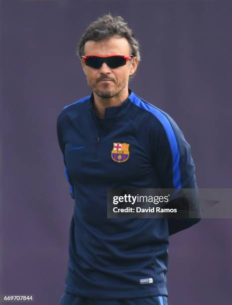 Luis Enrique manager of Barcelona looks on during a FC Barcelona training session on the eve of their UEFA Champions League quarter final second leg...