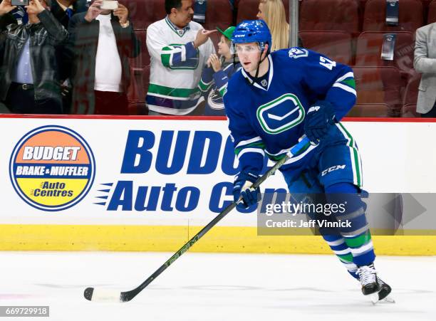 Drew Shore of the Vancouver Canucks skates up ice with the puck during their NHL game against the Anaheim Ducks at Rogers Arena March 28, 2017 in...