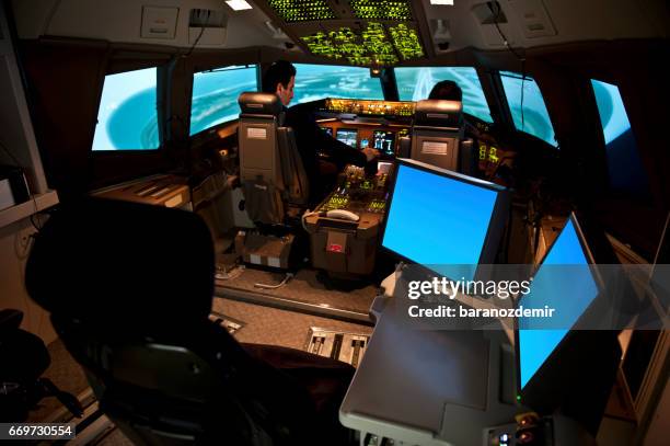 flight simulator - airline pilot stock pictures, royalty-free photos & images