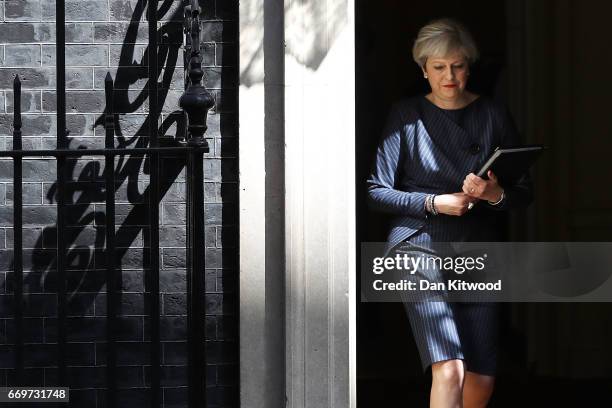 Prime Minister Theresa May prepares to make a statement to the nation in Downing Street on April 18, 2017 in London, United Kingdom. The Prime...