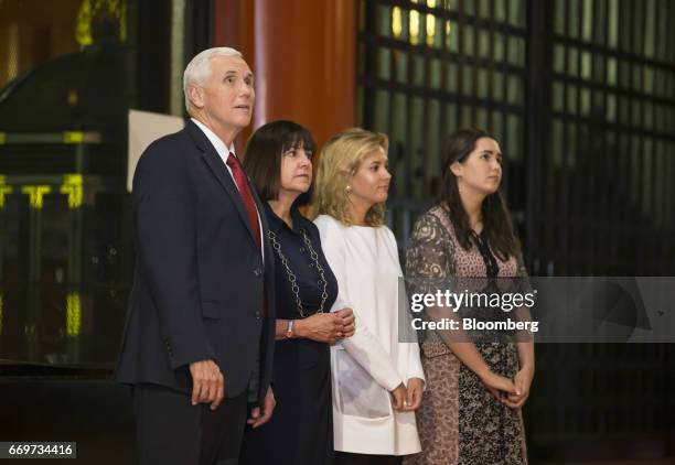 Vice President Mike Pence, left, second lady Karen Pence, center left, and their daughters Charlotte, center right, and Audrey, visit the Sensoji...