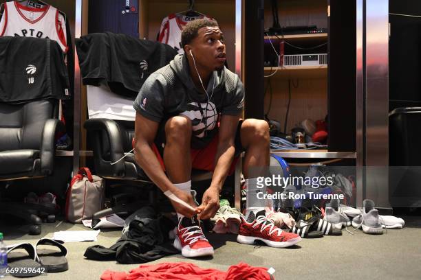 Kyle Lowry of the Toronto Raptors ties his shoes before the Round One of the Eastern Conference Playoffs game against the Indiana Pacers during the...