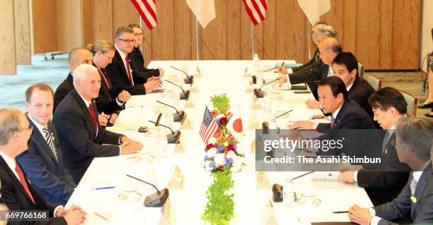 Vice President Mike Pence and Japanese Deputy Prime Minister and Finance Minister Taro Aso hold talks at Prime Minister Shinzo Abe's official...