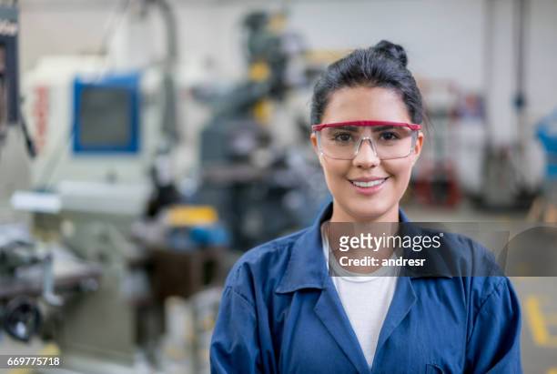 Portrait of an engineering student in a workshop
