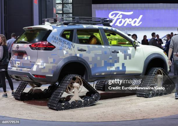 Nissan Rogue outfitted with tank treads during 2017 New York International Auto Show Press Day at Jacob K Javits Convention Center in New York City,...