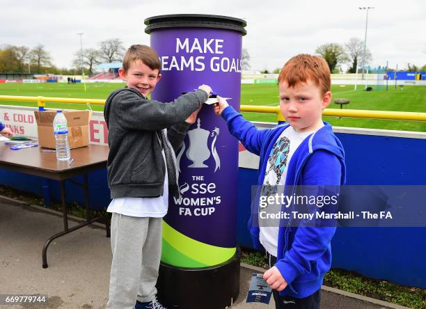 Fans take part in the Make Dreams Goals competition during the SSE Women's FA Cup Semi-Final match between Birmingham City Ladies and Chelsea Ladies...