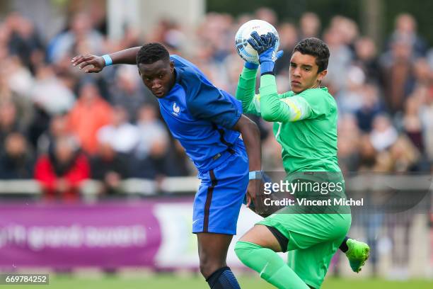 Ulrick Brad Eneme Ella of France and Joao Monteiro of Portugal during the U16 Mondial football Final match between France U16 and Portugal U16 on...
