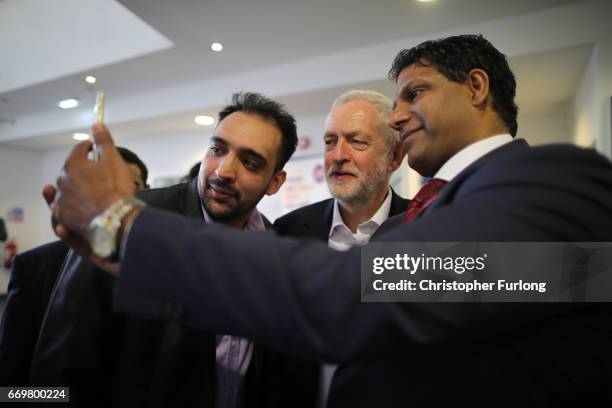 Labour party leader Jeremy Corbyn poses for a selfie during a visit to Birmingham Carers Hub to launch Labour's proposed Carer's Allowance increase...