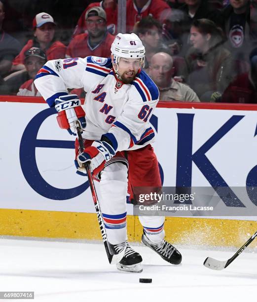 Rick Nash of the New York Rangers skates with the puck against the Montreal Canadiens in Game Two of the Eastern Conference Quarterfinals during the...