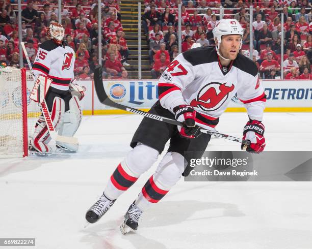 Dalton Prout of the New Jersey Devils follows the play against the Detroit Red Wings during the final home game ever played at Joe Louis Arena on...