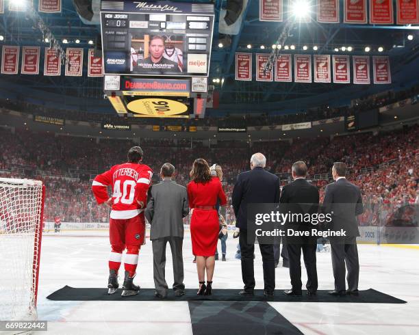 From L to R Henrik Zetterberg of the Detroit Red Wings, former Detroit Red Wing, Ted Lindsay, wife Emma Andersson Zetterberg holding her son Love,...