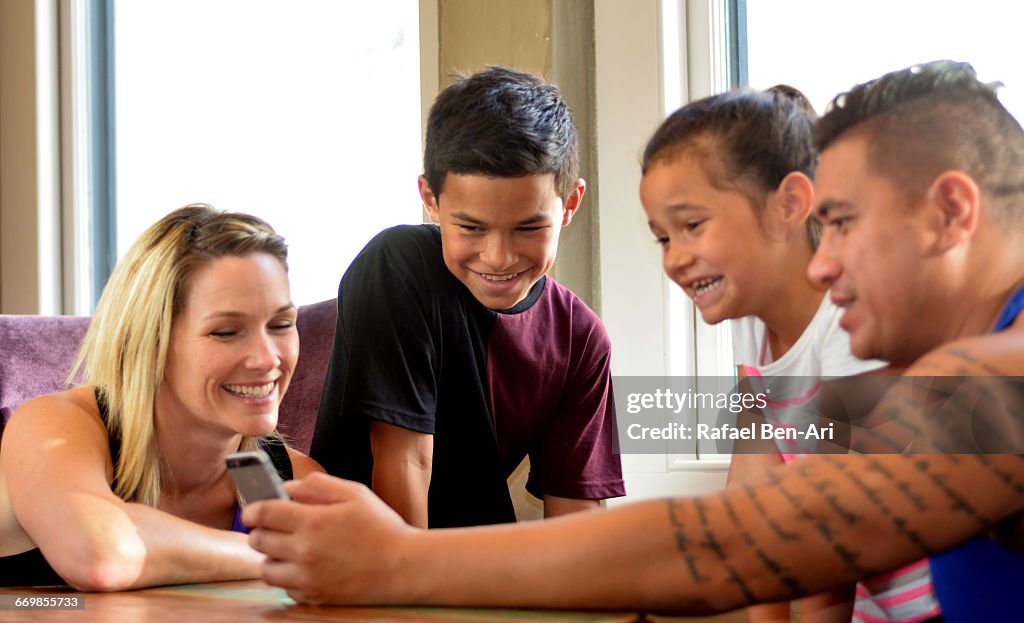 Family Uses mobile phone together