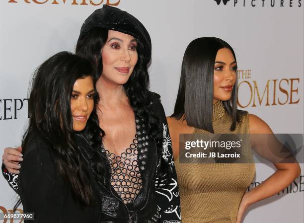 Kourtney Kardashian, Singer Cher and Kim Kardashian West attend the premiere of Open Road Films' 'The Promise' on April 12, 2017 in Hollywood,...