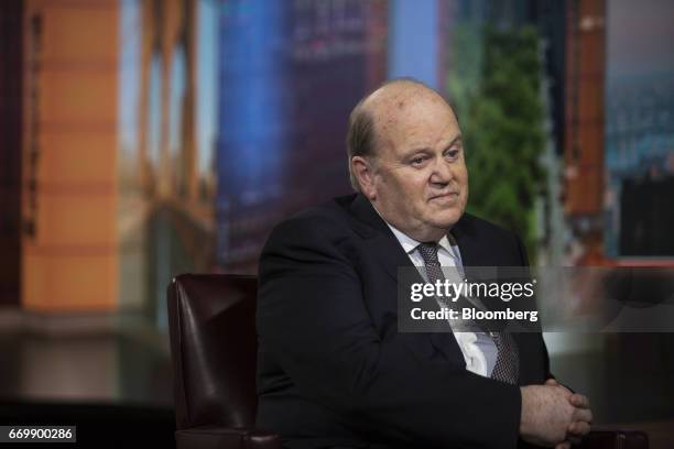 Michael Noonan, Ireland's finance minister, listens during a Bloomberg Television interview in New York, U.S., on Tuesday, April 18, 2017. Noonan...