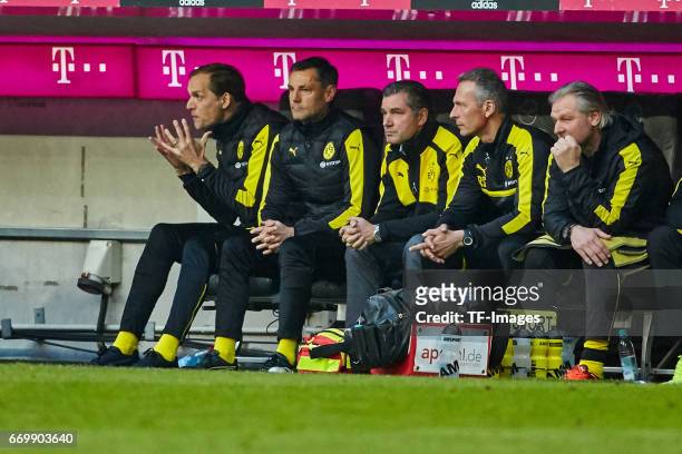 Head coach Thomas Tuchel of Dortmund , Arno Michels, Michael Zorc of Dortmund , Rainer Schrey and Wolfgang de Beer of Dortmund looks on during the...