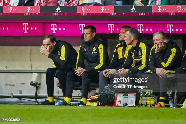 Head coach Thomas Tuchel of Dortmund , Arno Michels, Michael Zorc of Dortmund , Rainer Schrey and Wolfgang de Beer of Dortmund looks on during the...