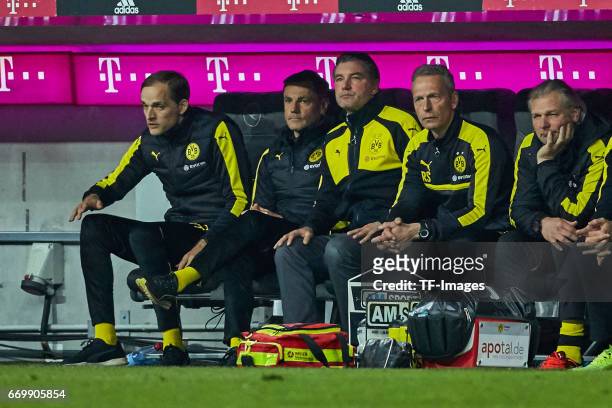 Head coach Thomas Tuchel of Dortmund , Arno Michels, Michael Zorc of Dortmund , Rainer Schrey and Wolfgang de Beer of Dortmund looks on during the...