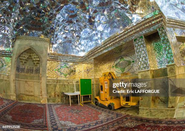 Elevateur char to clean the mirrors in the Shah-e-Cheragh mausoleum on October 23, 2015 in Shiraz, Fars Province, Iran.