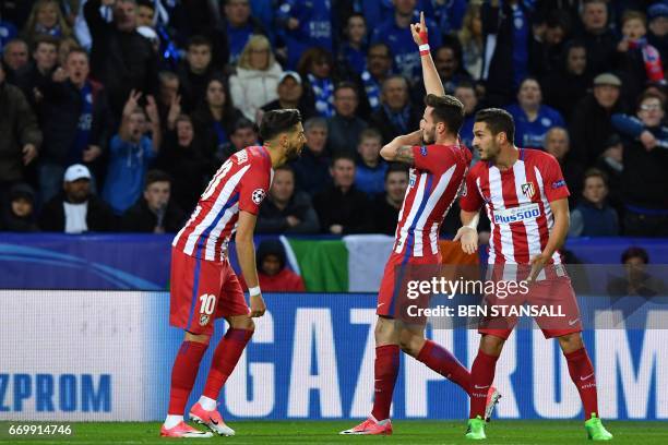 Atletico Madrid's Spanish midfielder Saul Niguez celebrates scoring his team's first goal during the UEFA Champions League quarter-final second leg...